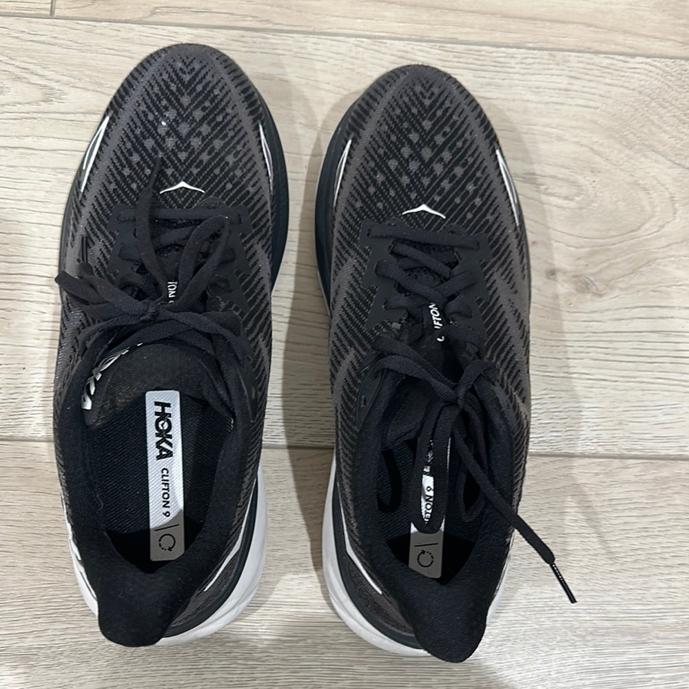 Hoka Women’s Clifton 9 Black and White Athletic Shoes